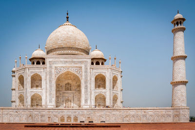 Low angle view of taj mahal against clear blue sky