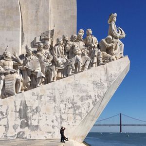 Monument to discoveries against blue sky