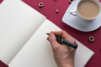 High angle view of coffee cup on table