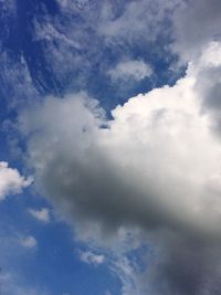 Low angle view of clouds in blue sky