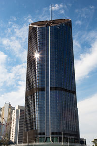 Low angle view of skyscraper against sky