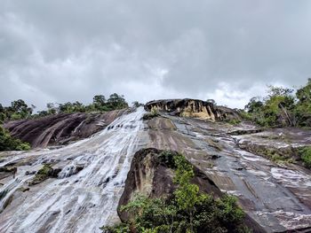 Panoramic view of rock formations against sky