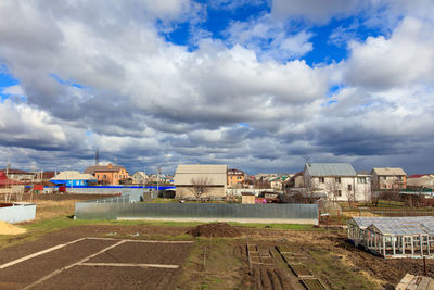 High angle shot of townscape against sky