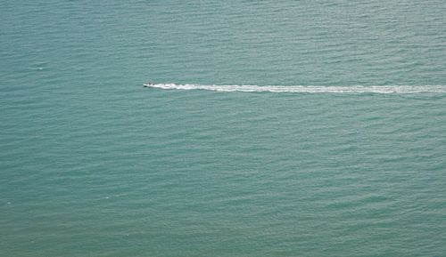 High angle view of boat sailing in sea