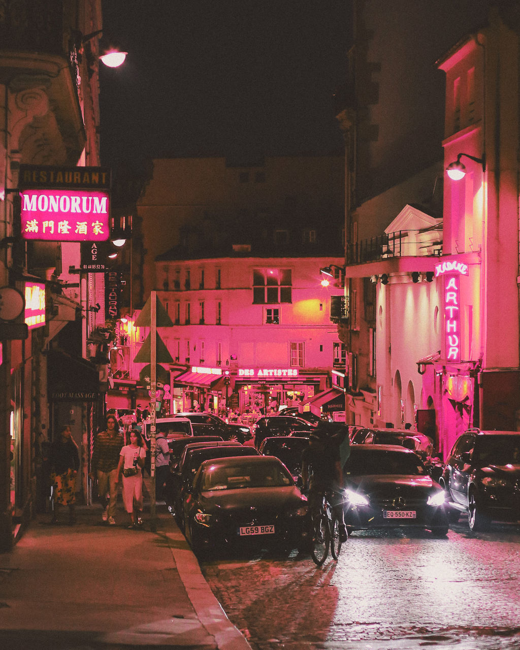 VEHICLES ON ROAD AT NIGHT