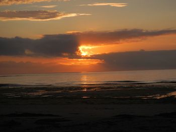 View of calm sea at sunset