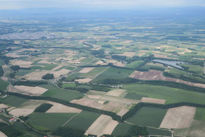 High angle view of agricultural field against sky