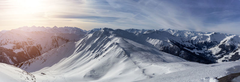 Scenic view of snowcapped mountains against sky