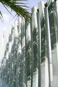 Low angle view of columns against sky