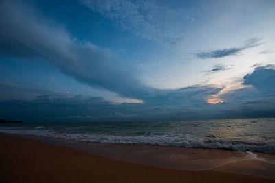 Scenic view of beach against sky