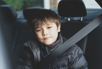 Portrait of boy in car