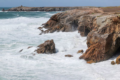 Spectacular natural cliffs on beautiful and famous coastline cote sauvage on peninsula quiberon