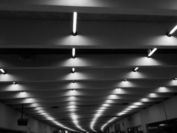 Low angle view of illuminated ceiling