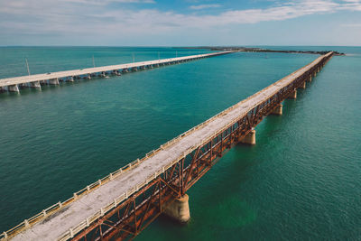 High angle view of pier over sea against sky