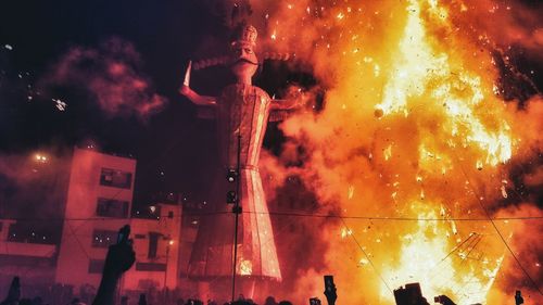 View of illuminated people at night