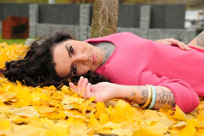 Portrait of young woman lying down