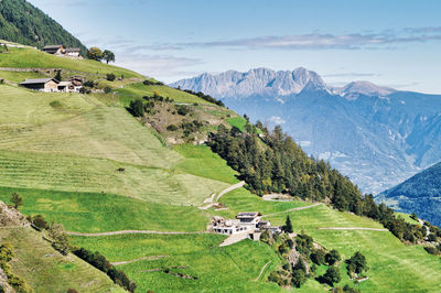 Scenic view of landscape and mountains against sky