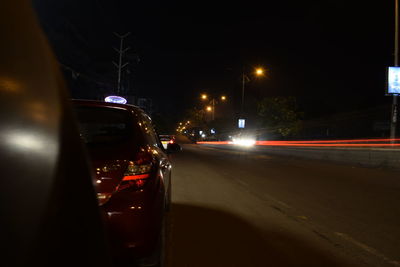 Cars moving on road at night