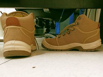 Close-up of shoes on table