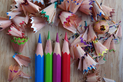 High angle view of colored pencils on table