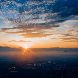 Aerial view of landscape at sunset