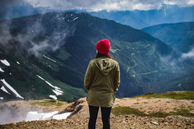 Rear view of woman looking at mountain