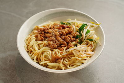 Close-up of noodles in bowl on table