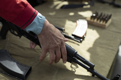 Close-up of man working on table