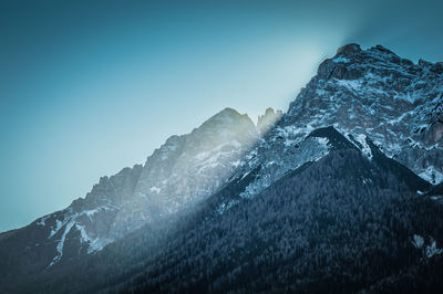 Scenic view of snow covered mountains