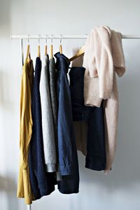 Clothes hanging on rack at home