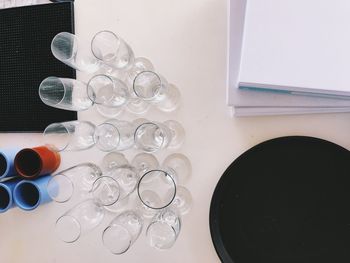 High angle view of glass bottles on table