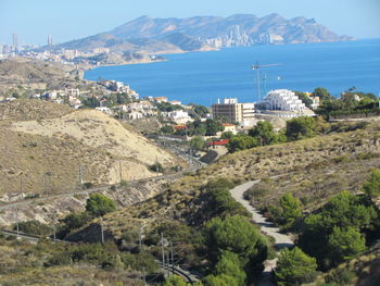 High angle view of city by sea