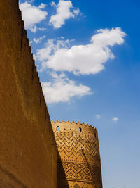 Low angle view of old building against sky