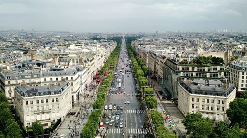 Champs-elysees amidst buildings seen from arc de triomphe