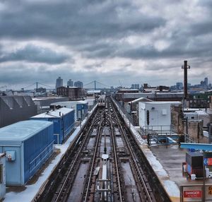 View of city against cloudy sky