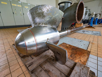 Close-up of machine part on table