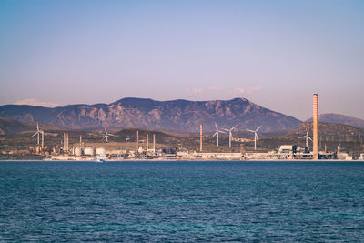 Scenic view of sea against clear blue sky