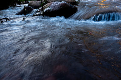 Blurred motion of rocks in sea