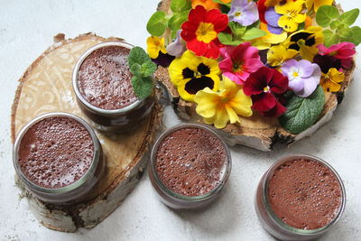 High angle view of various flowers in bowl on table