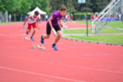 Full length of man running on field