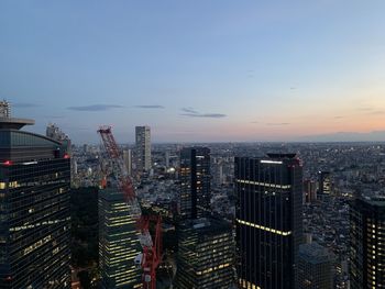 High angle view of buildings against sky during sunset