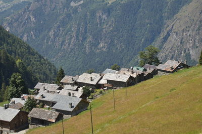 High angle view of houses and trees on mountain