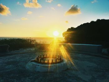 Bright sun seen through building terrace at morning