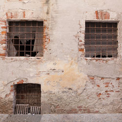 Low angle view of window on old building