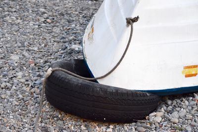 Close-up of tire on sand