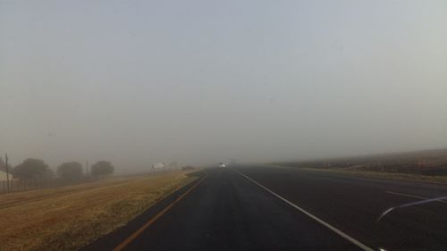 Country road passing through landscape