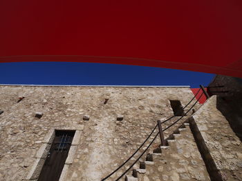 Low angle view of building against clear sky