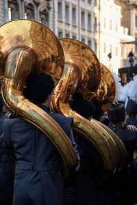 Young artists carry sousaphones perform on new year parade in london