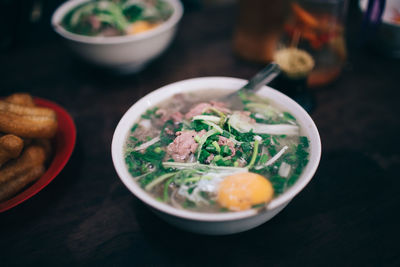 Close-up of soup served on table