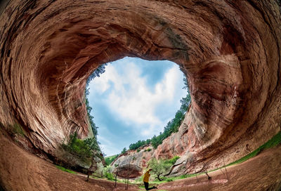 View of rock formations through hole